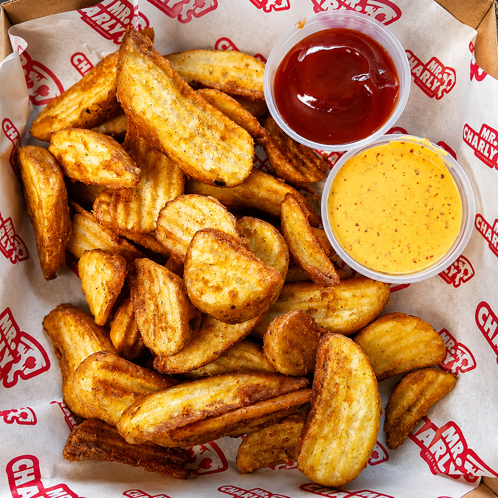 Papas gajo con aderezos de Mr. Charly Pizza
